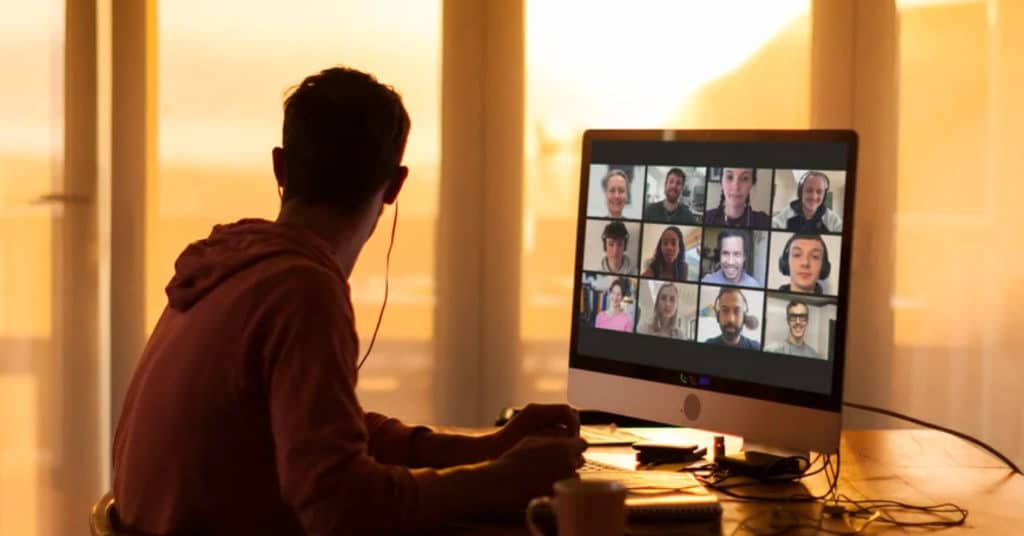 man in video call to his remote design team
