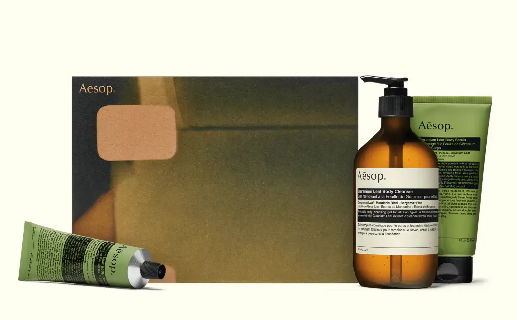Aesop products with minimalist packaging, muted earthy tones, and an elegant promotional box.