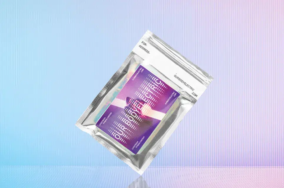 A bag of assorted pills displayed on a vibrant blue and pink textured background.