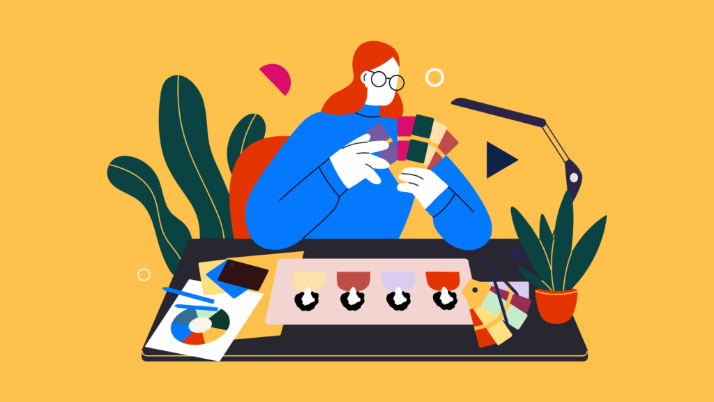 Person at desk reviewing color swatches and design samples, surrounded by plants.