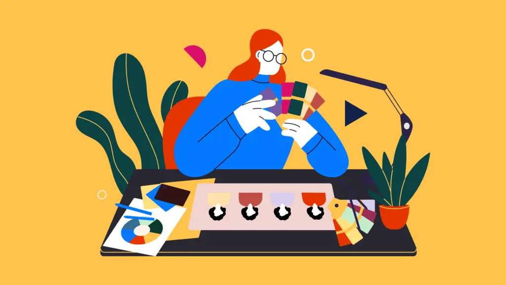 Person at desk reviewing color swatches and design samples, surrounded by plants.