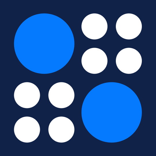 Two large blue circles and eight small white circles arranged in a grid to illustrate proportion in design.