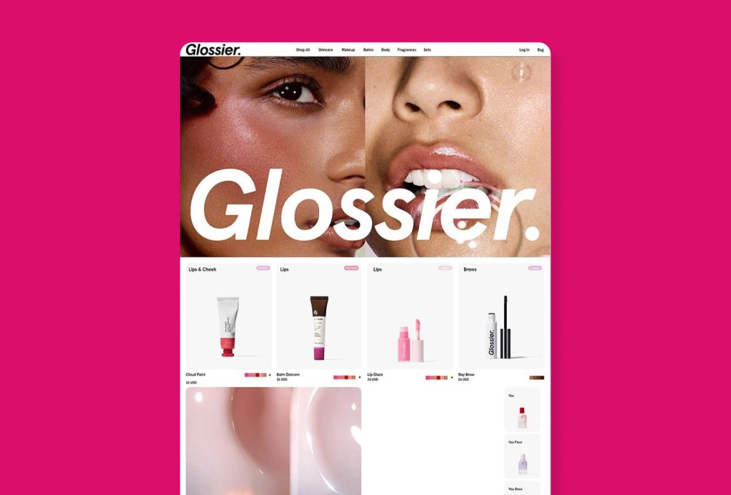 Glossier website design example featuring soft product visuals, approachable beauty branding, and a clean ecommerce layout